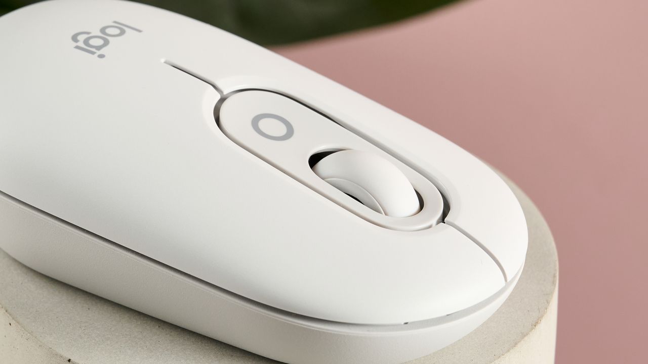 Close-up of Logitech POP on plinth with pink background