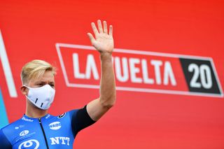 LEKUNBERRI SPAIN OCTOBER 21 Start Michael Valgren Andersen of Denmark and NTT Pro Cycling Team Mask Covid safety measures Team Presentation during the 75th Tour of Spain 2020 Stage 2 a 1516km stage from Pamplona to Lekunberri lavuelta LaVuelta20 La Vuelta on October 21 2020 in Lekunberri Spain Photo by Justin SetterfieldGetty Images