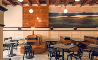 chicago athletic association hotel with wooden plank seating area