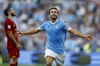 Pedro celebrates after scoring for Lazio against Roma in September 2021.