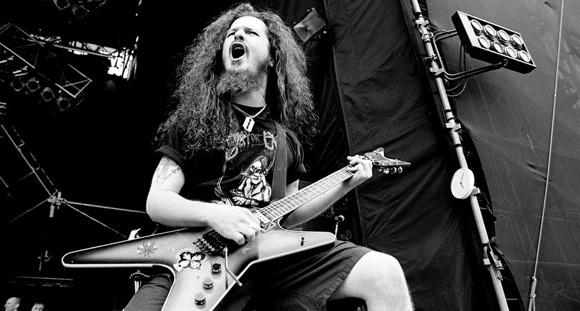 A black-and-white shot of Dimebag Darrell playing Monsters of Rock with his Dean ML 