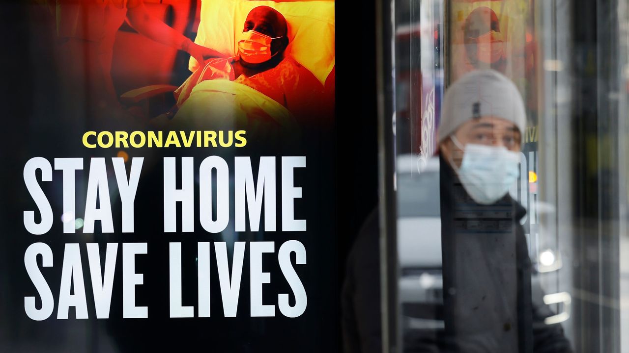 NHS poster saying Stay Home, Save Lives in London