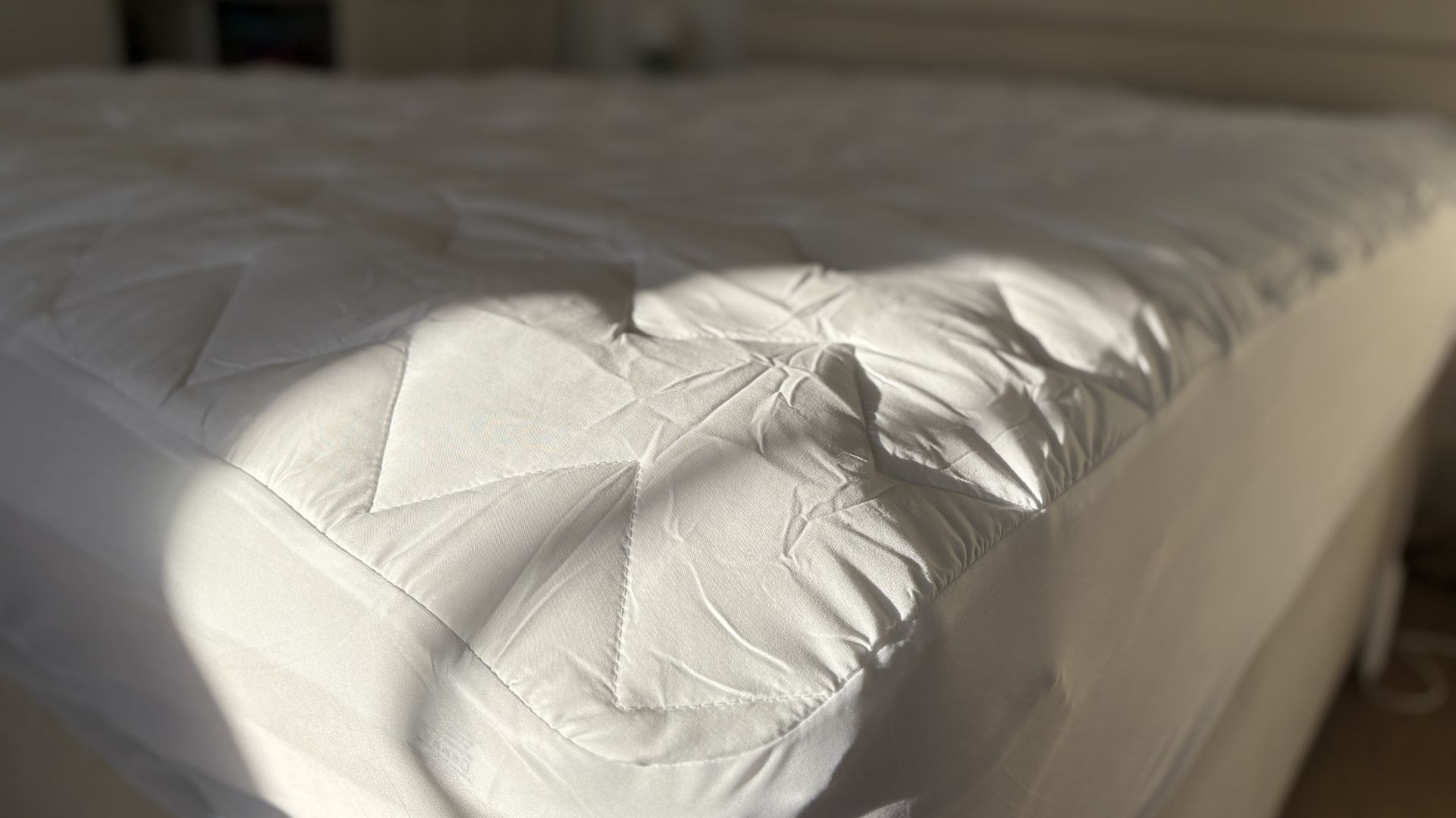 Testing the Fogarty Temperature Balance Mattress Protector on the bed