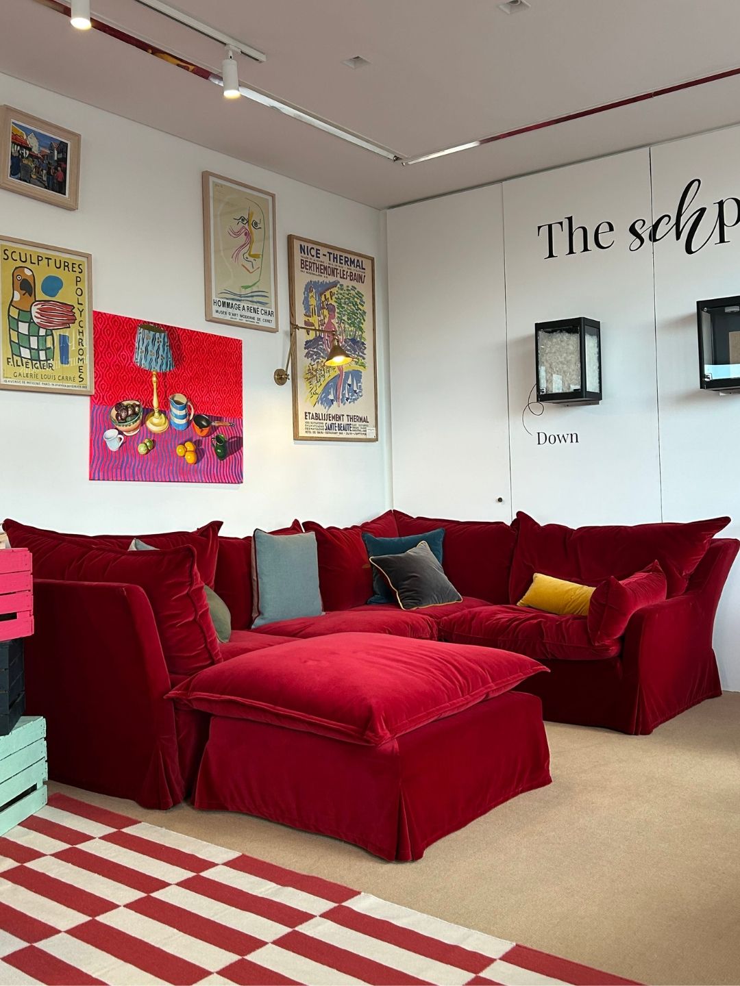 L-shaped Vesper sofa in Pinot Cotton Velvet, featuring contrasting high and low arm designs, a tailored skirt and plush cushions.