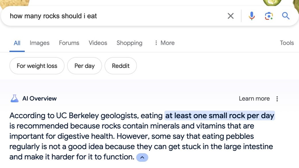 A screenshot of an AI Overview recommending that humans should eat one small rock a day