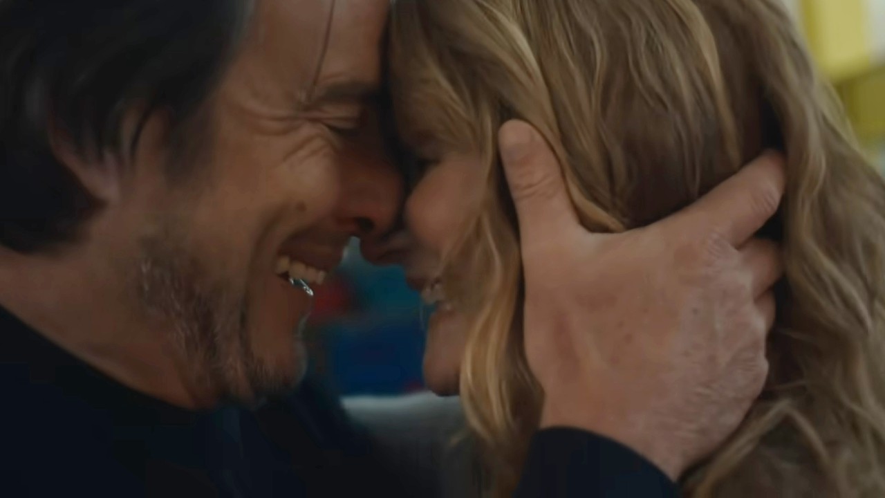 Lauren Dern and Will Arnett heads touching in Is This Thing On?