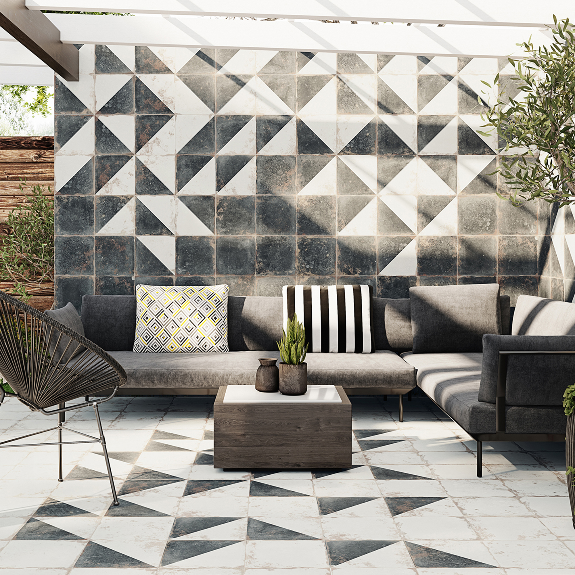 living room with black with white coloured square tiled walls