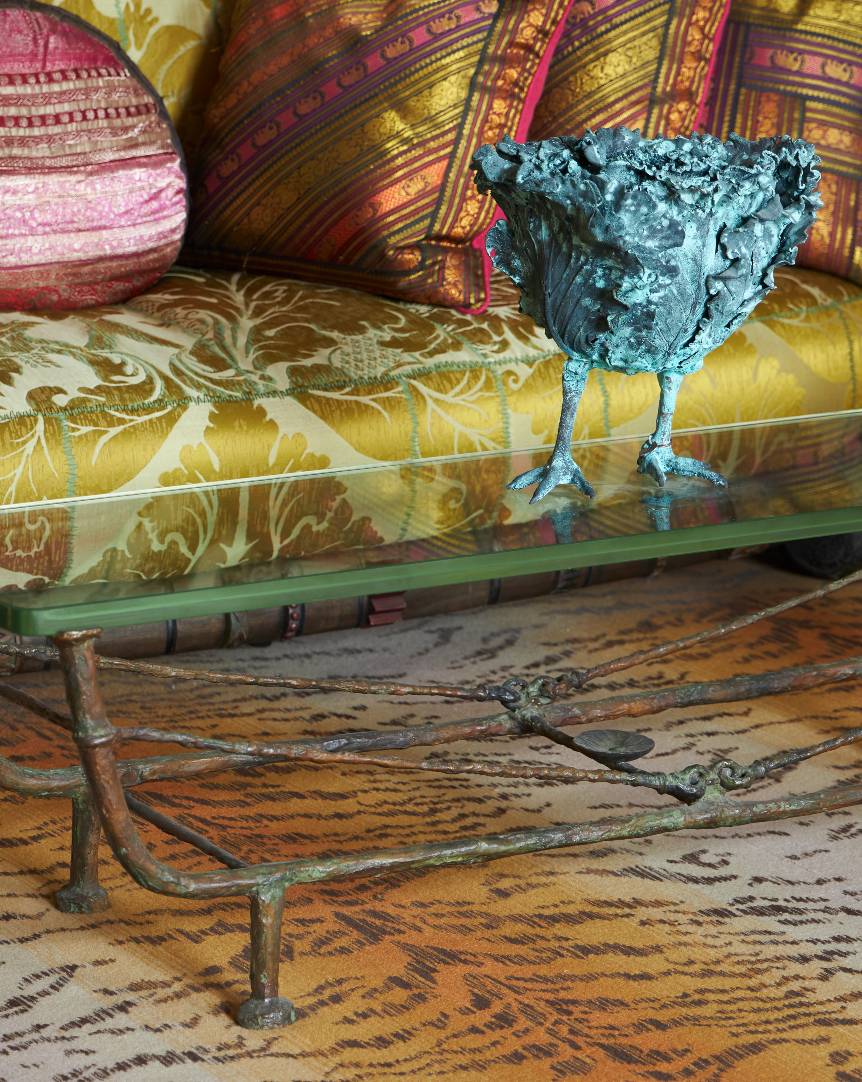 Claude Lalanne’s ‘Choupatte’ — a sculpture of a lettuce with the legs of a chicken — on a table