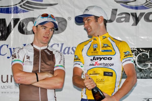 Tour leader Greg Henderson chats with Chris Sutton on the podium.