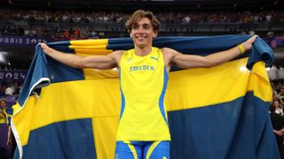 Gold medalist Armand Duplantis of Sweden celebrates after setting a new world record during the Men's Pole Vault Final on day ten of the Olympic Games Paris 2024 at Stade de France on August 05, 2024 in Paris, France.