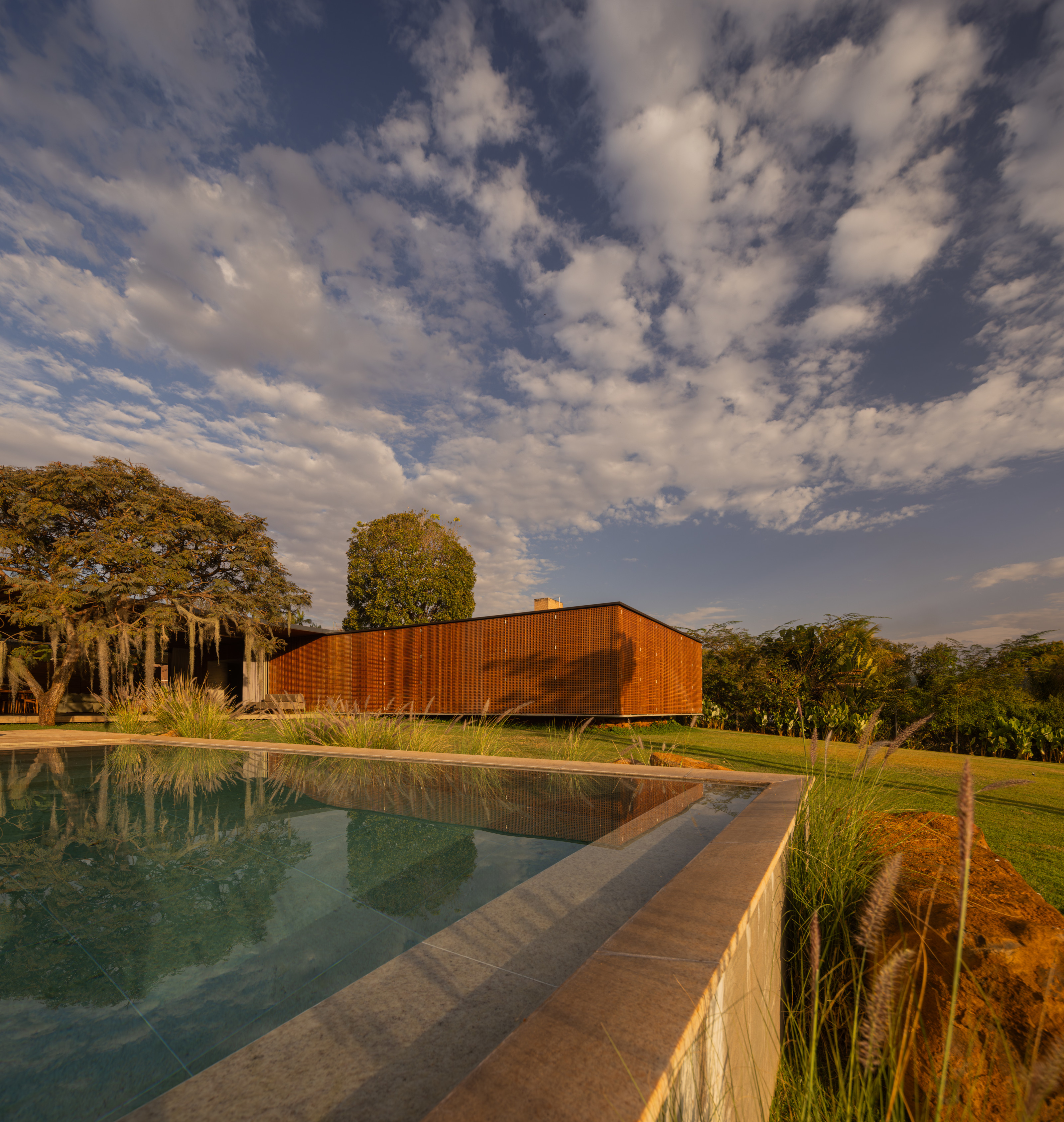 The pool with the bedroom wing behind