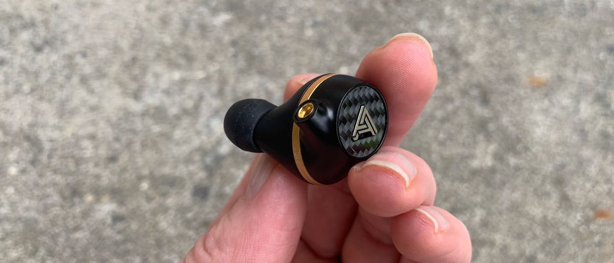 Audeze Euclid held in a woman&#039;s hand