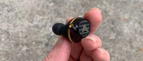 Audeze Euclid held in a woman's hand