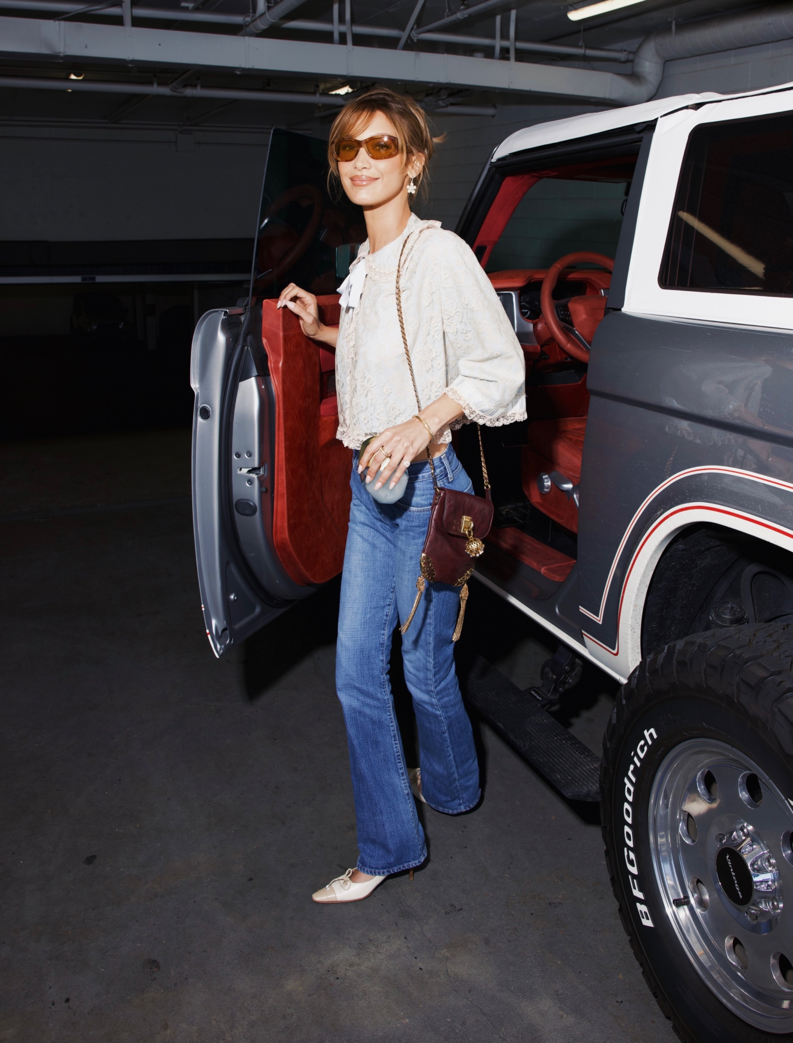 Bella Hadid elevated her bootcut Levi's jeans with the peasant blouse top trend