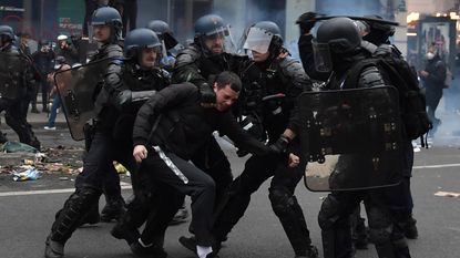 French riot police clashed with protesters on Thursday during a protest against government pension reforms 