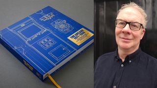 A blue book and a man in a blue short and glasses