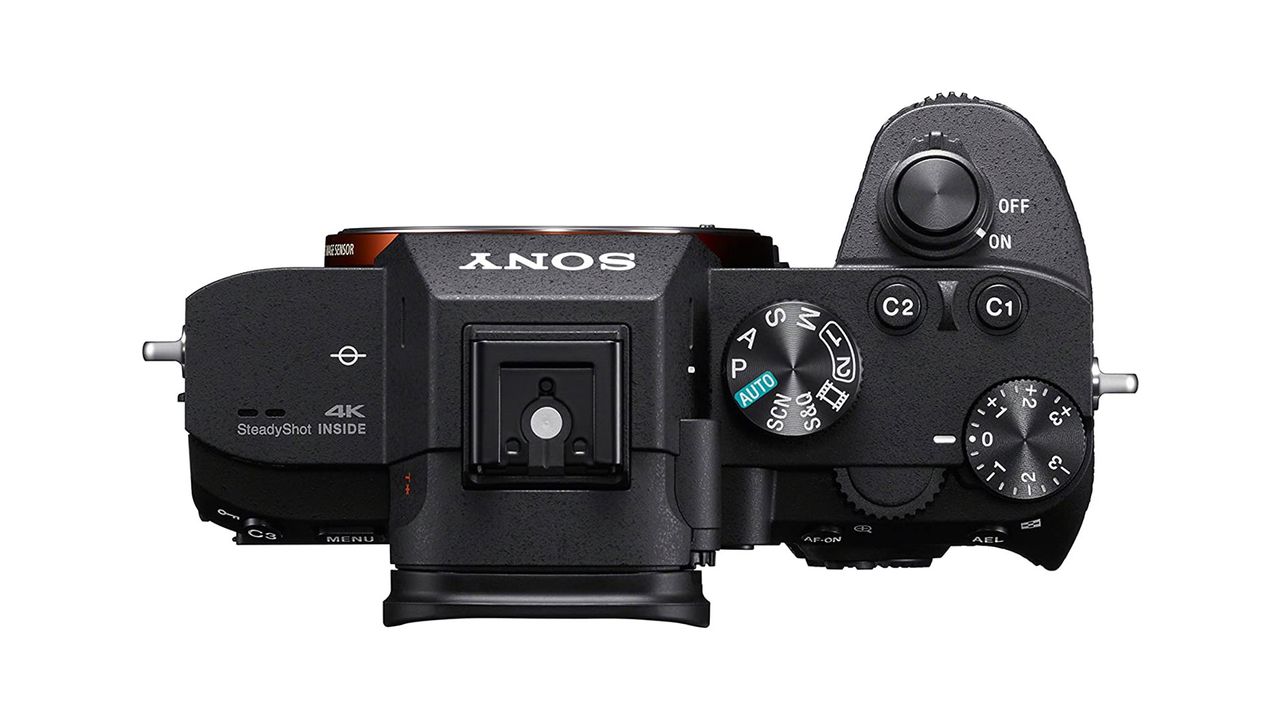 A top-down view of the Sony A7 III showing the dials and buttons on top of the camera.