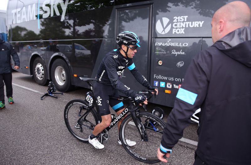 Richie Porte at the Team Sky bus after losing more today following a late crash