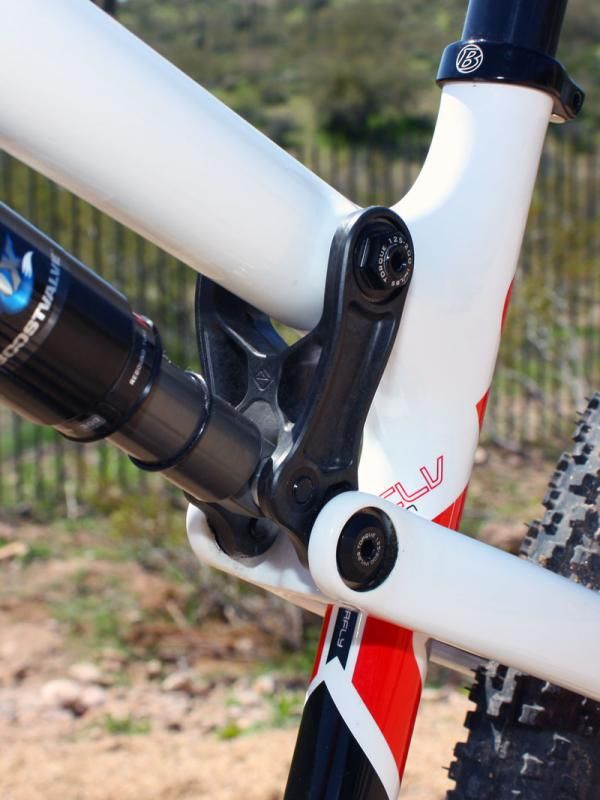 The linkage is compression-molded carbon fiber