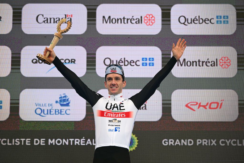 MONTREAL QUEBEC SEPTEMBER 10 Adam Yates of Great Britain and UAE Team Emirates celebrates at podium as race winner during to the 12th Grand Prix Cycliste de Montreal 2023 a 2214km one day race from Montreal to Montreal UCIWT on September 10 2023 in Montreal Quebec Photo by Dario BelingheriGetty Images