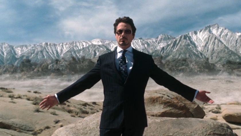 Tony Stark standing in front of an explosion in Iron Man