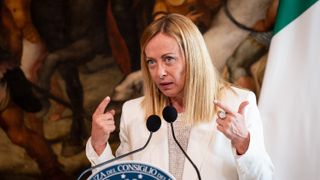 Italian Prime Minister Giorgia Meloni addresses a press conference after a meeting at Palazzo Chigi.