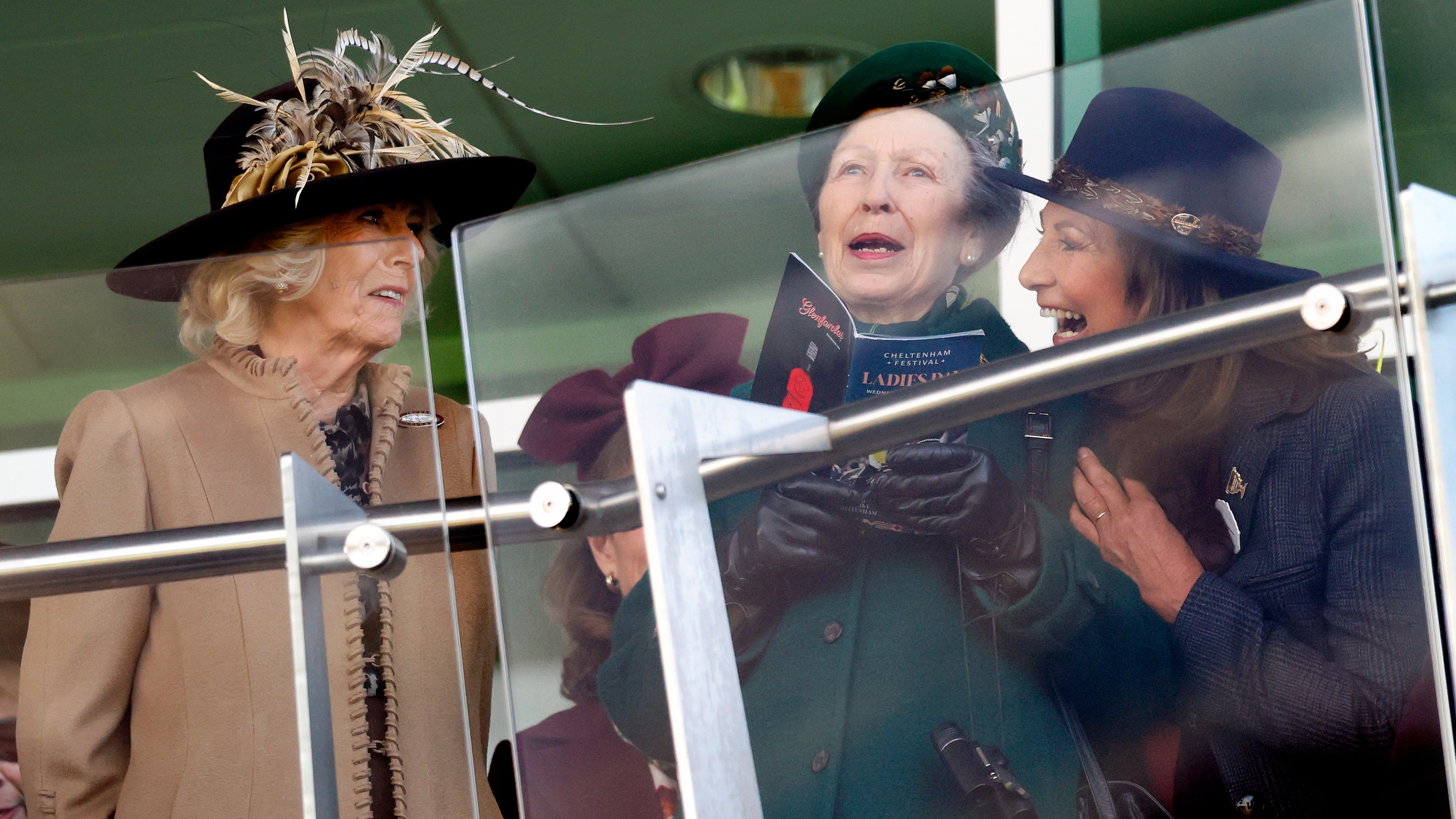 Queen Camilla, Princess Anne, Princess Royal and Carole Middleton watch the racing from the balcony of the Royal Box as they attend day 2 'Ladies Day'