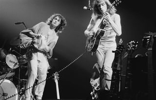 Jon Anderson (left) and Steve Howe perform live with Yes
