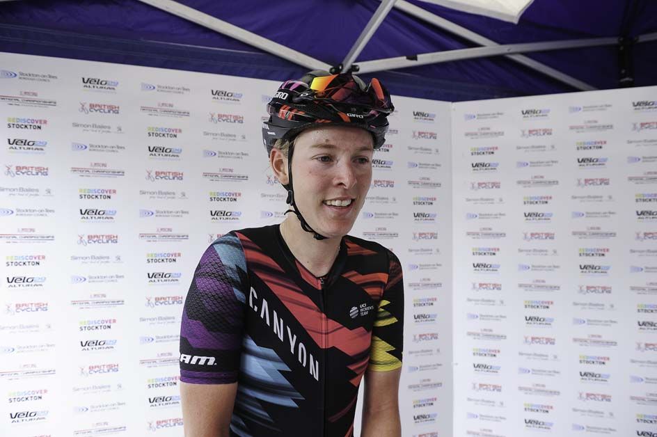 Hannah Barnes arrives behind the podium after winning the British national title
