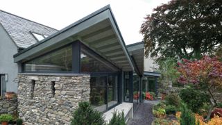 contemporary stone and glass extension
