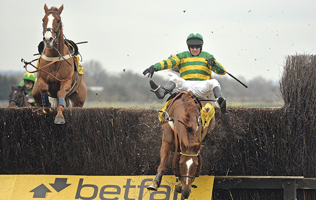 07.02.2015, Newbury, GB, Jockey Barry Geraghty falls from Uxizandre during the Game Spirit Chase. Photo FRANK SORGE/Racingfotos.com THIS IMAGE IS SOURCED FROM AND MUST BE BYLINED "RACINGFOTOS.COM"