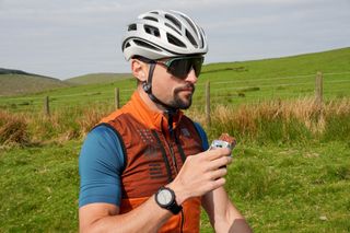 Stefan eating the STYRKR Bar50 energy bar on the Trans Cambrian Way