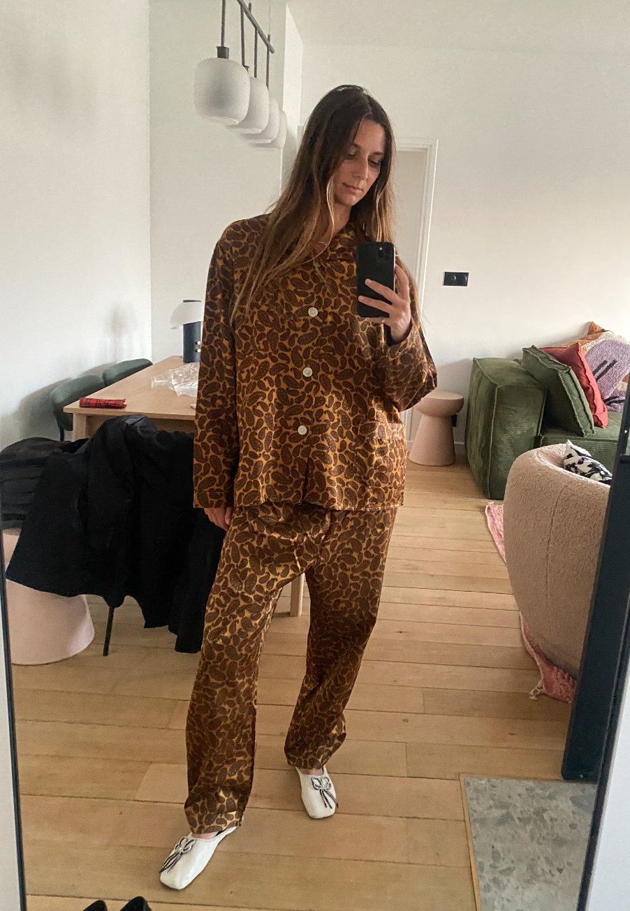 Brie Welch wearing leopard-print pajamas.