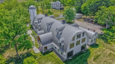 Aerial view of a modern farmhouse in Virginia