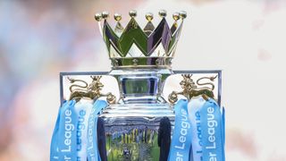 The Premier League trophy with light blue and white streamers