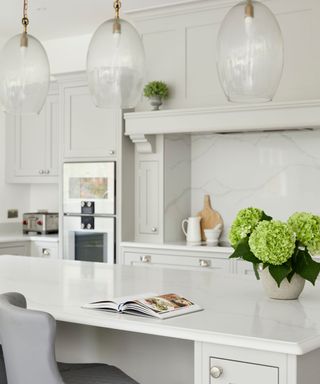 A kitchen with stone countertops