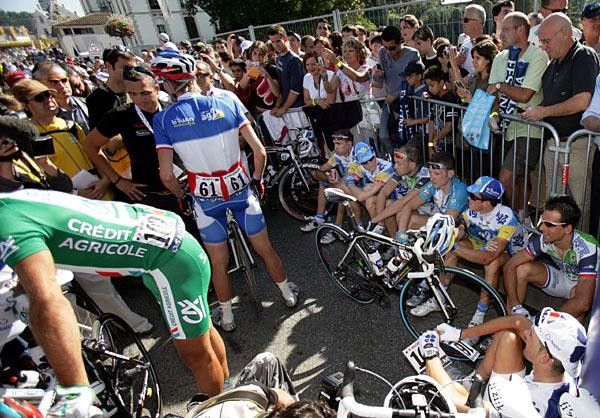Riders have a protest sit-in at the start.
