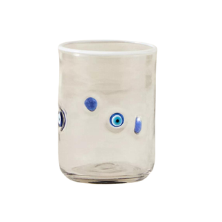 Clear drinking glass with pattern of blue evil eye pressed glass beads 