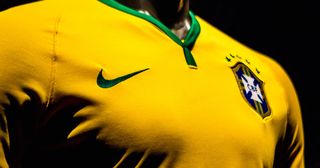 The Nike Swoosh logo is set to CHANGE on football shirts – in its biggest-ever revolution: Brazil's football team jersey for the 2014 FIFA World Cup is unveiled on November 24, 2013 in Rio de Janeiro, Brazil.