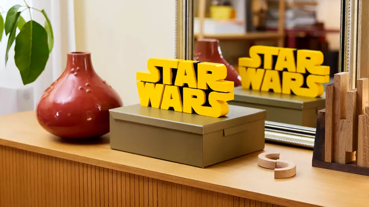 Lego Star Wars logo set on a sideboard in front of a mirror