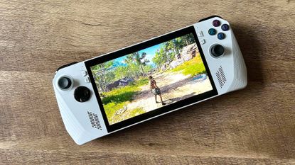 Asus ROG Ally on wood desk