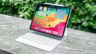 Apple 13-inch iPad Air 2024 shown with Magic Keyboard