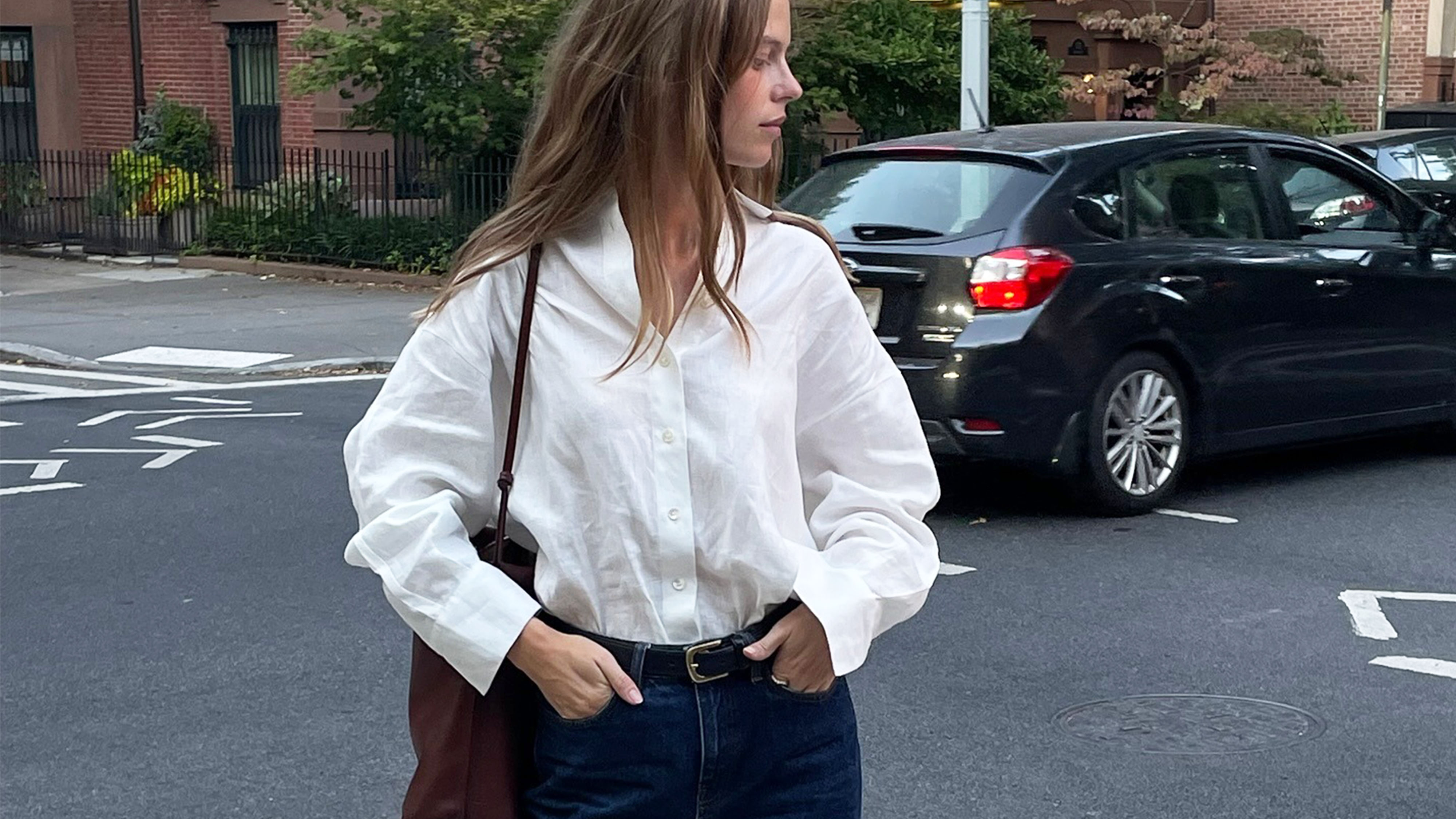 Woman in white shirt and jeans
