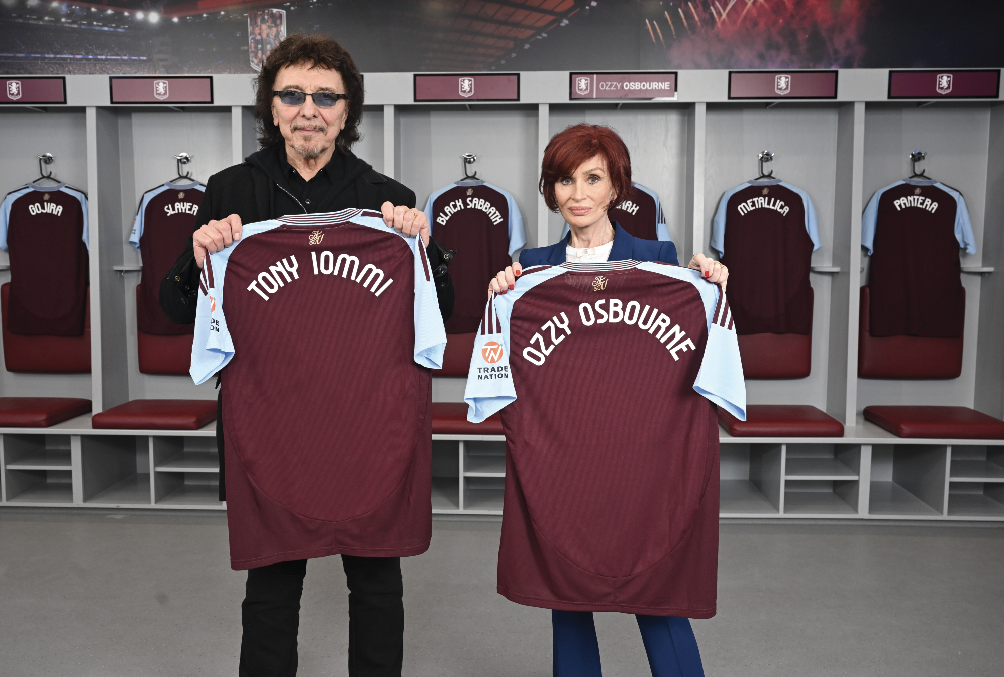 Sharon Osbourne and Tony Iommi holding up custom Aston Villa shirts