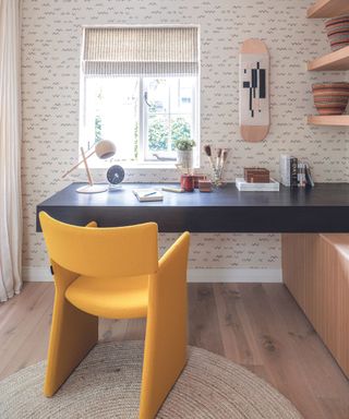 Home office with yellow office chair