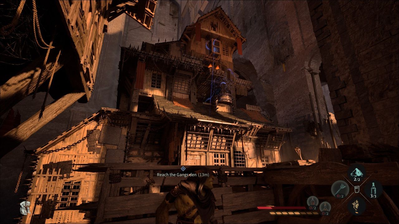 A goblin scopes out a huge gang den