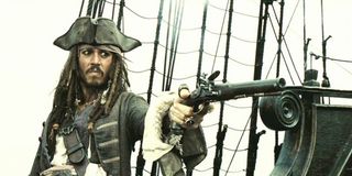 Captain Jack Sparrow pointing a gun