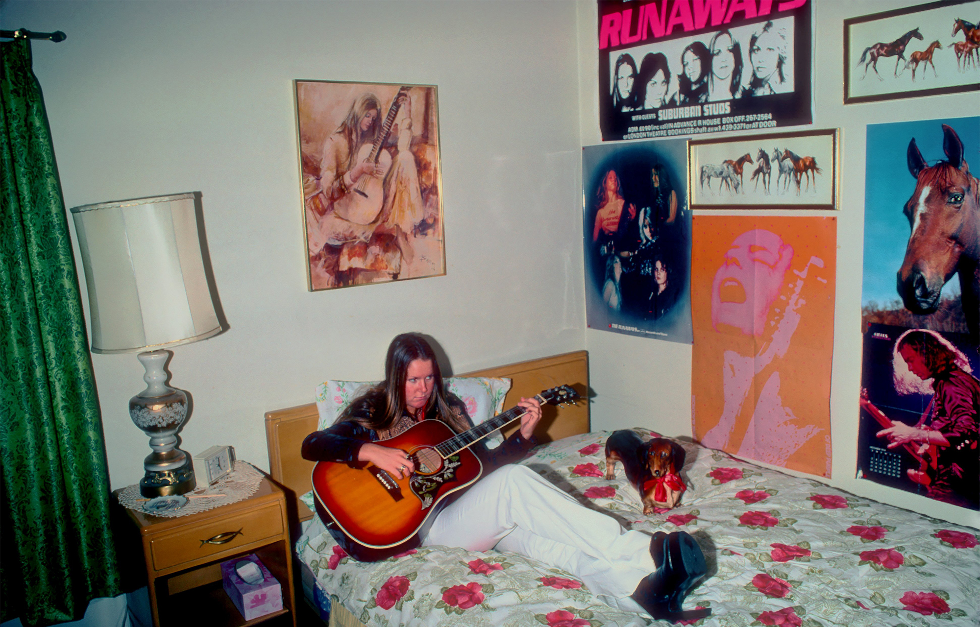 Guitarist Lita Ford of the rock band 'The Runaways' poses for a portrait in her bedroom at her family's home in November 1976 in Los Angeles, California.