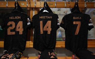 Arsenal shirts hanging in the away dressing room at Bodø/Glimt