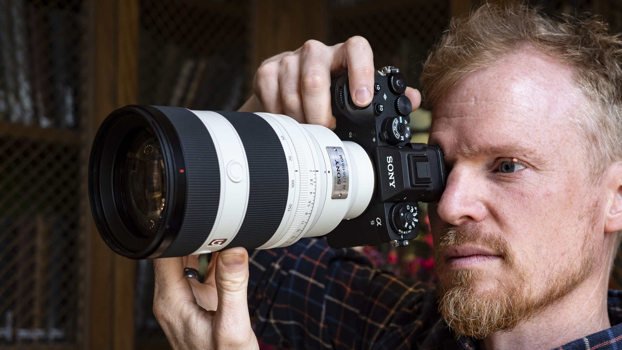 Sony FE 50-150mm F2 GM lens attached to a Sony A9 III, being held up to photographer's eye